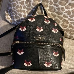 Kate Spade “out of the woods” mini backpack